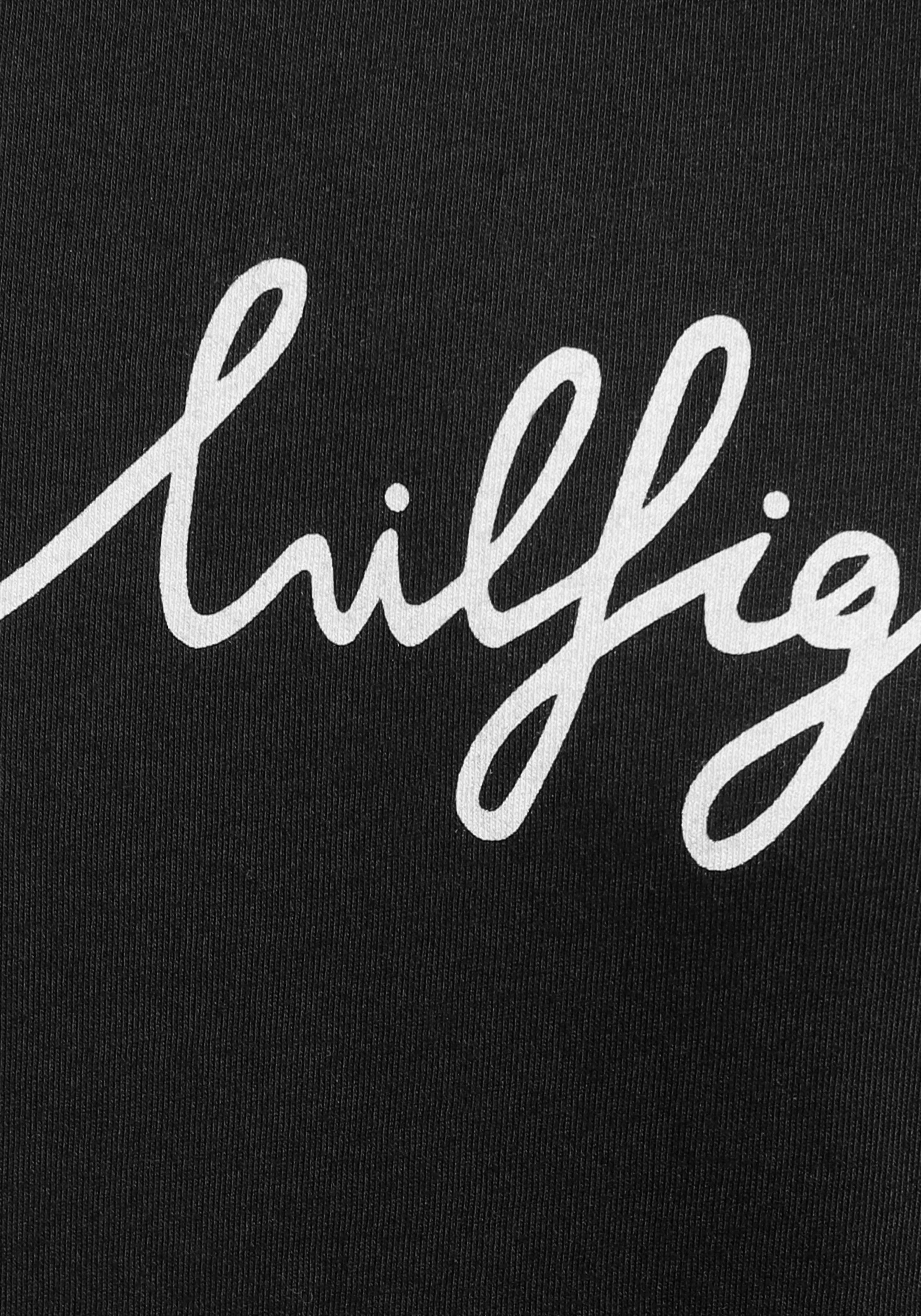 Tommy Hilfiger T-Shirt »HERITAGE CREW NECK GRAPHIC TEE«, mit Tommy Hilfiger Script Logo-Schriftzug & Logo-Flag am Saum