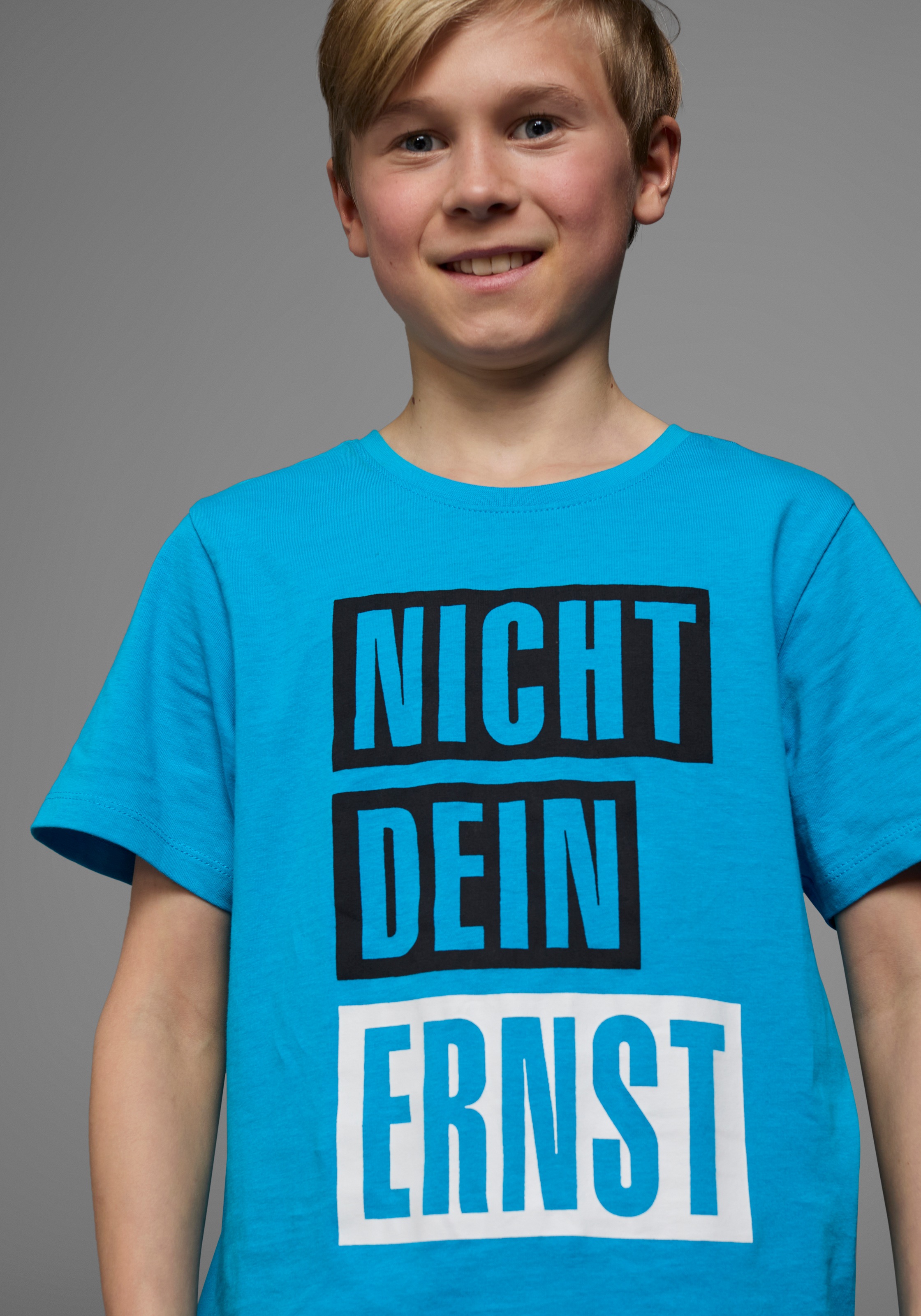 KIDSWORLD T-Shirt »mit Spruch: NICHT DEIN ERNST«, Kurzarm, Basic-Passform, mit trendigem Aufdruck