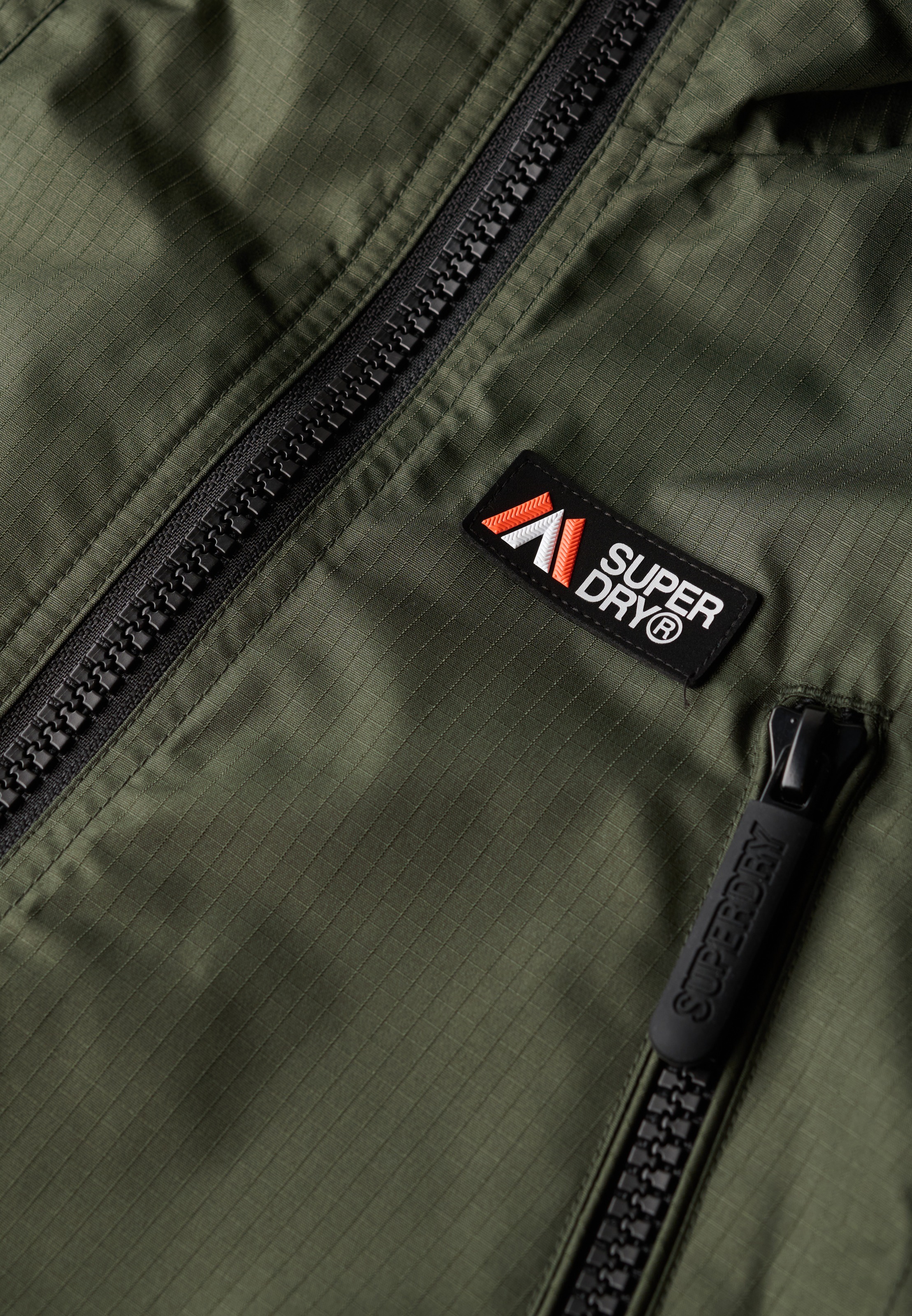 Superdry Outdoorjacke »HOODED MTN WINDBREAKER JACKET«, mit Kapuze