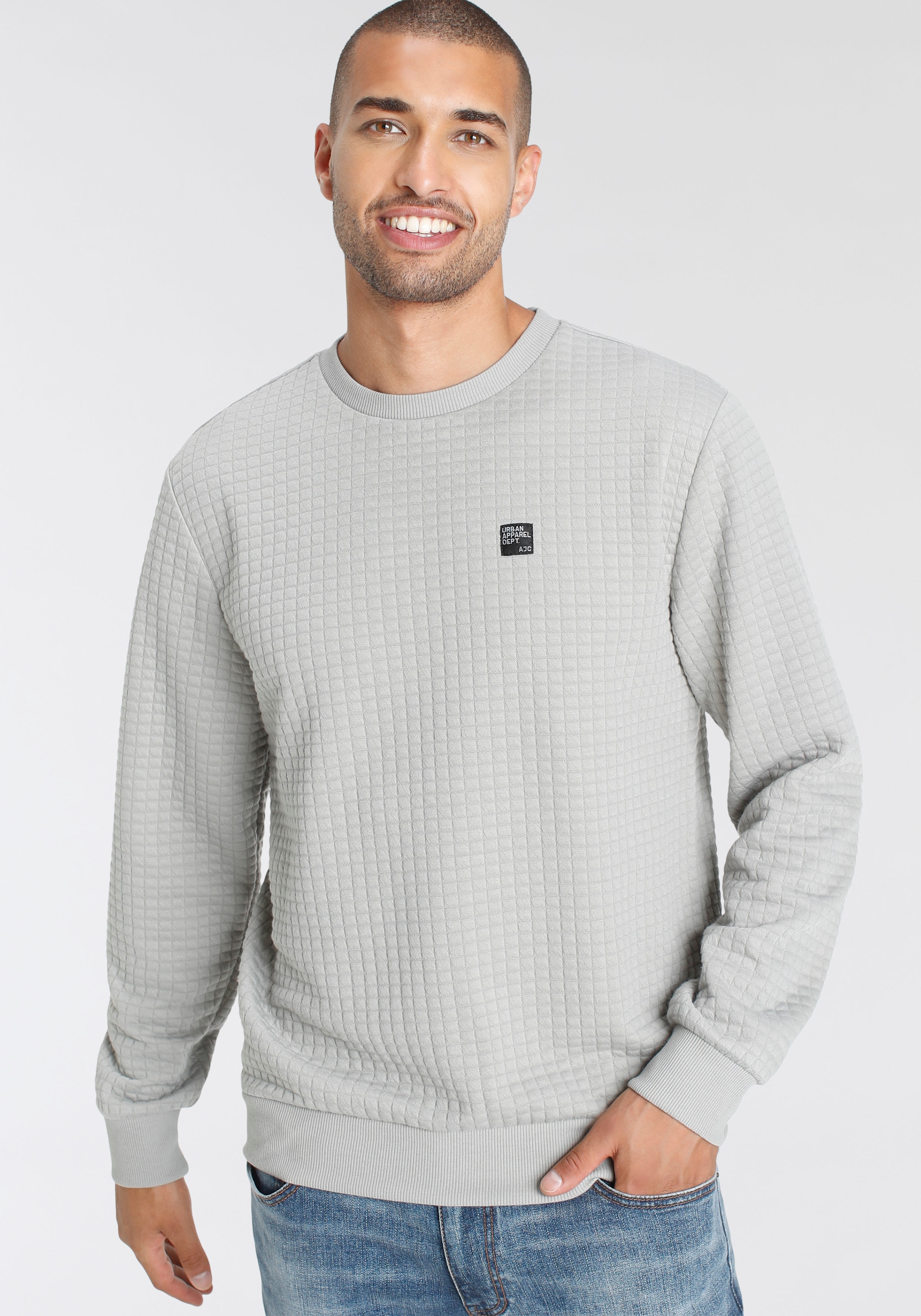 AJC Sweatshirt, mit spezieller Materialstruktur und Logobadge