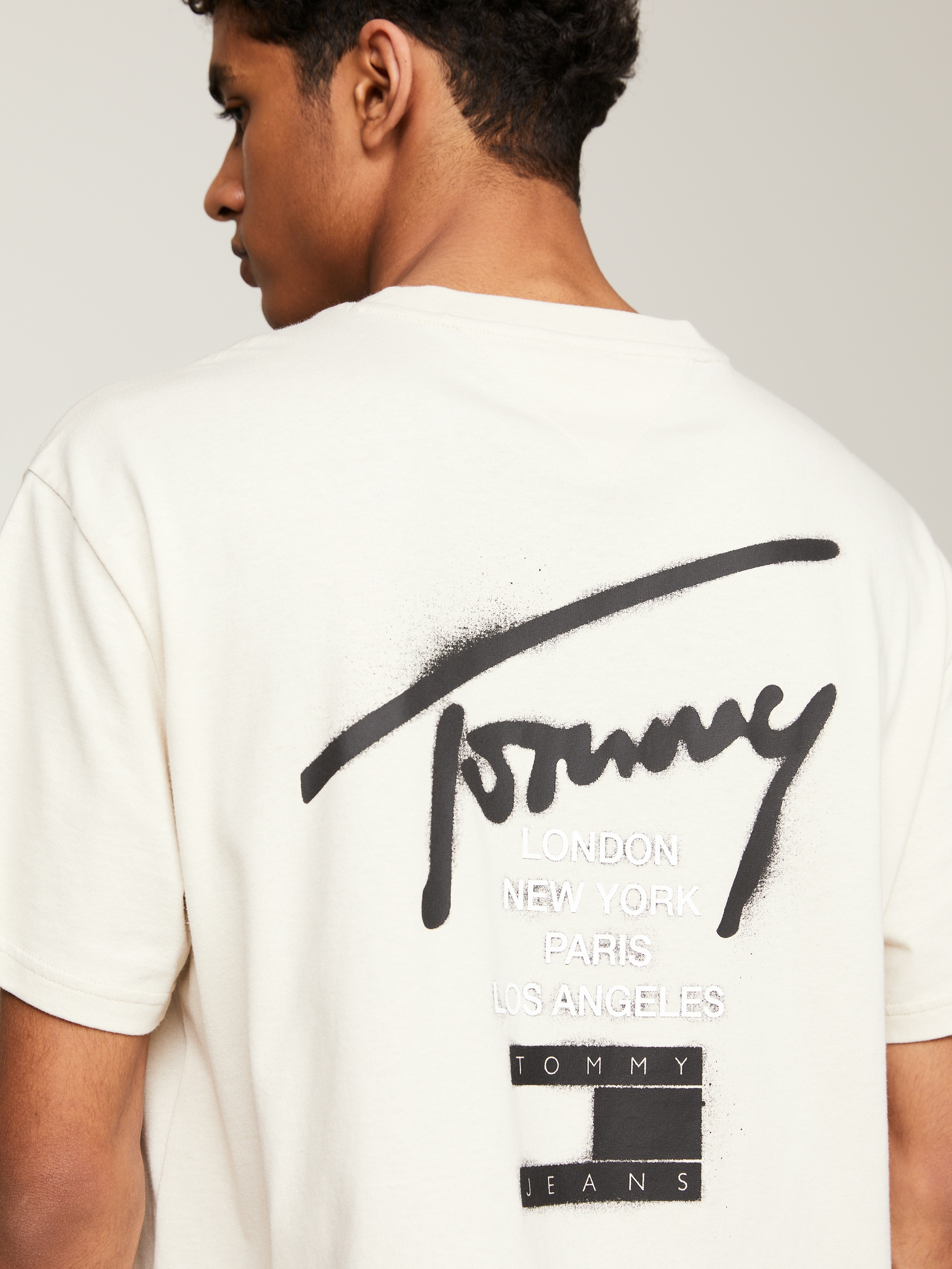 Tommy Jeans T-Shirt »TJM REG GRAFFITI SIG TEE EXT«, mit Logoschriftzug