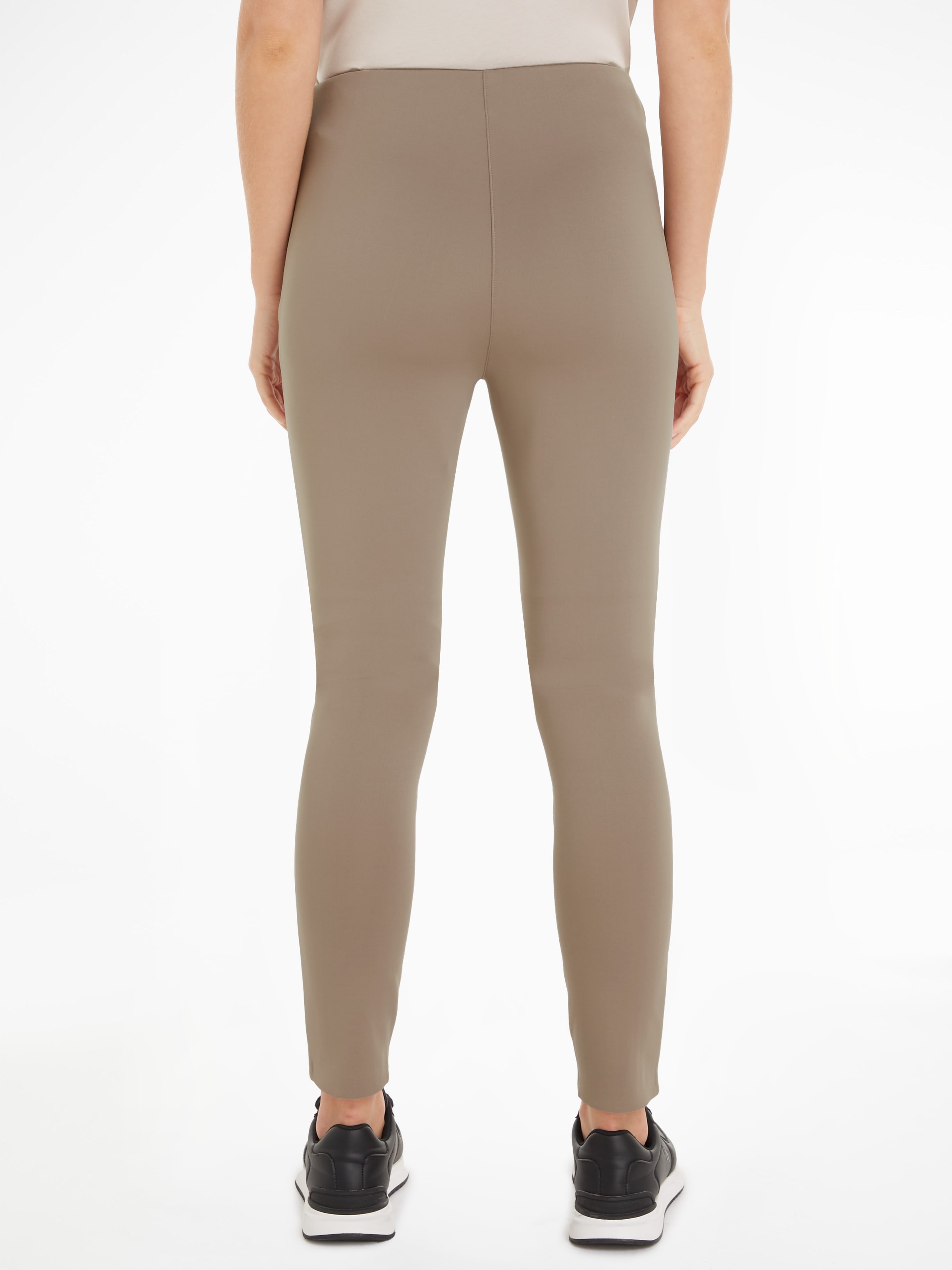 Calvin Klein Leggings »TECHNICAL KNIT LEGGING«, mit Reissverschluss am Beinabschluss