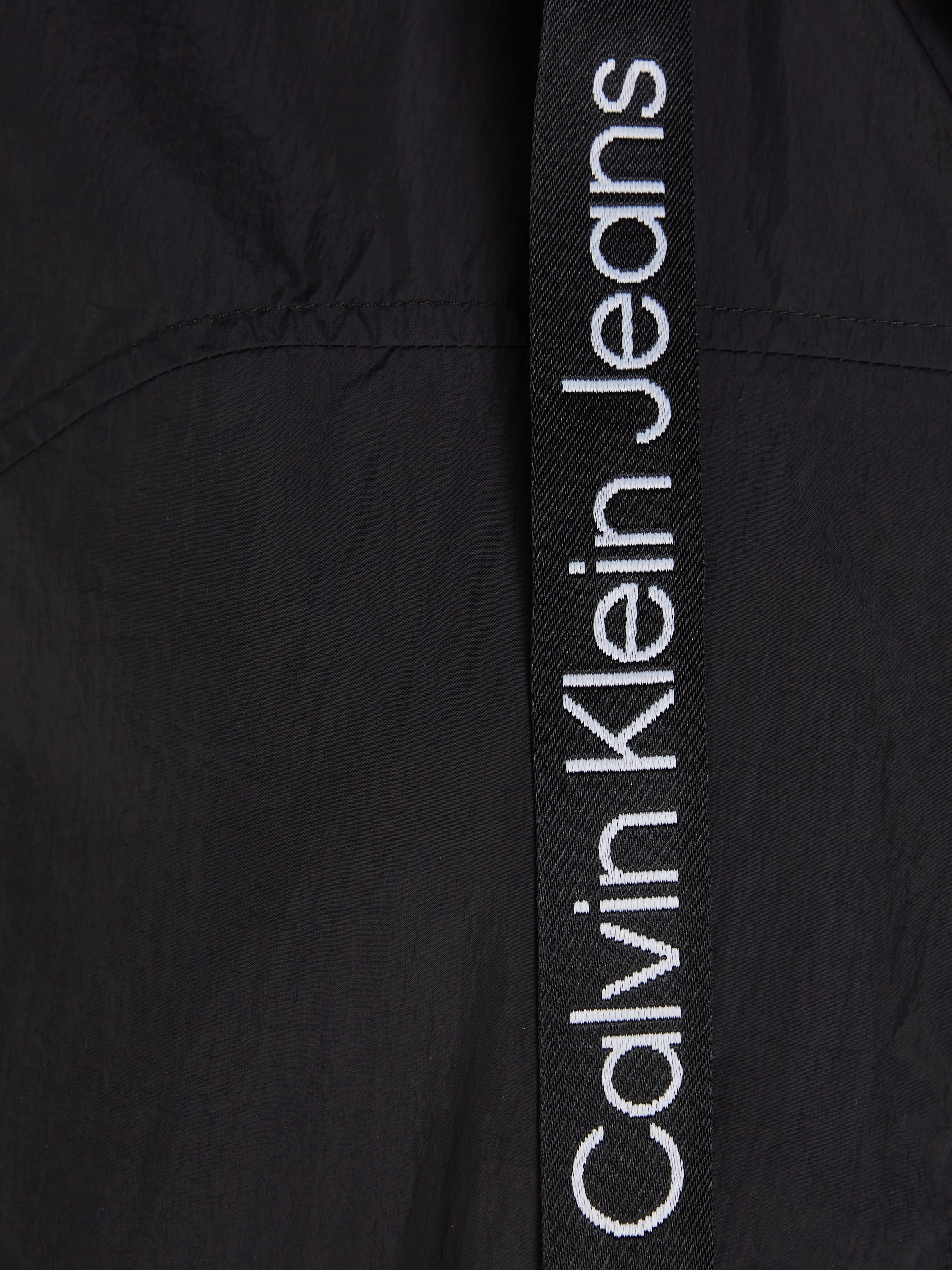 Calvin Klein Jeans Outdoorjacke »LOGO DRAWSTRING WINDBREAKER«, mit Kapuze, mit Logoschriftzug