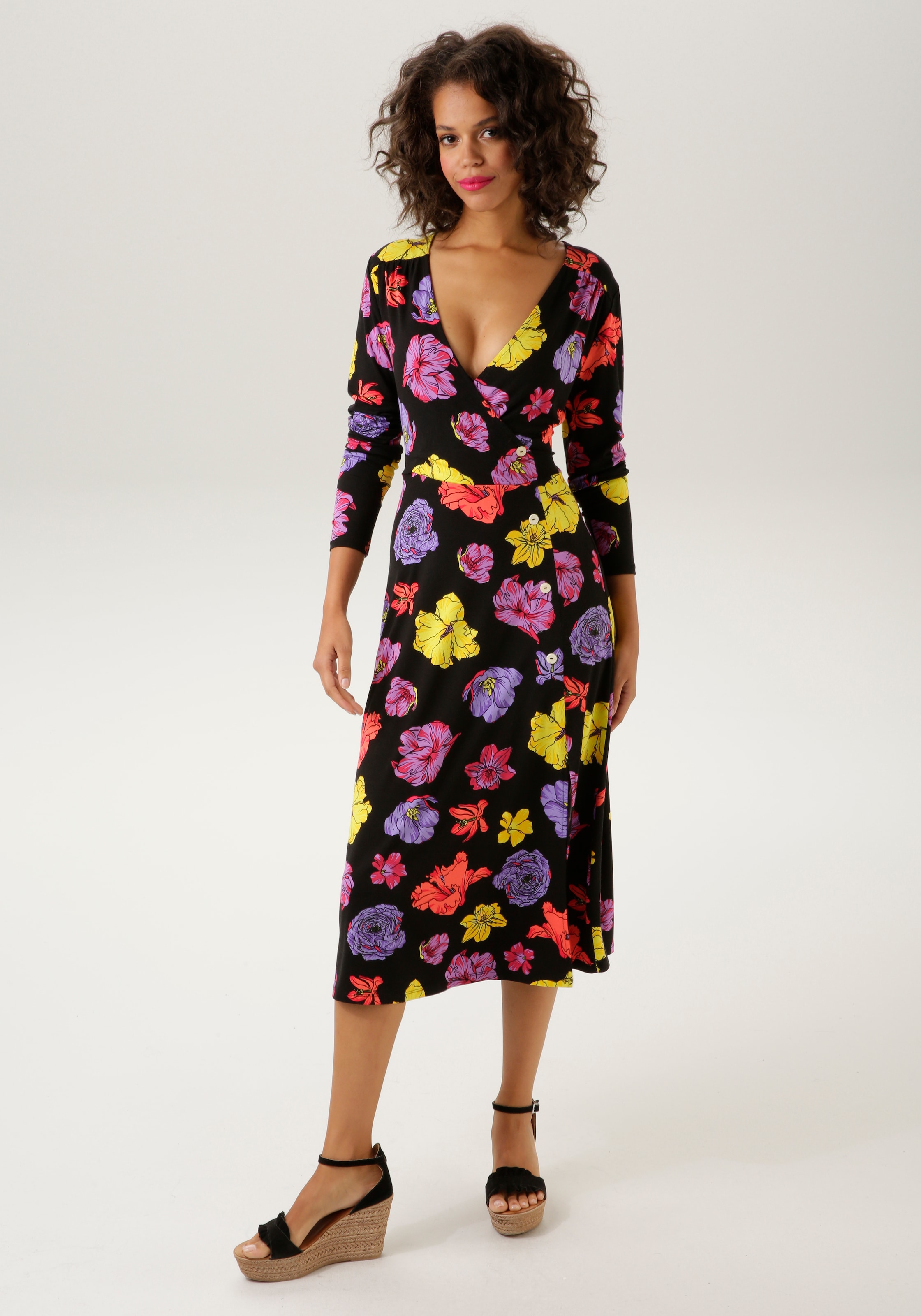 Aniston CASUAL Jerseykleid, mit farbenfrohen Blüten bedruckt