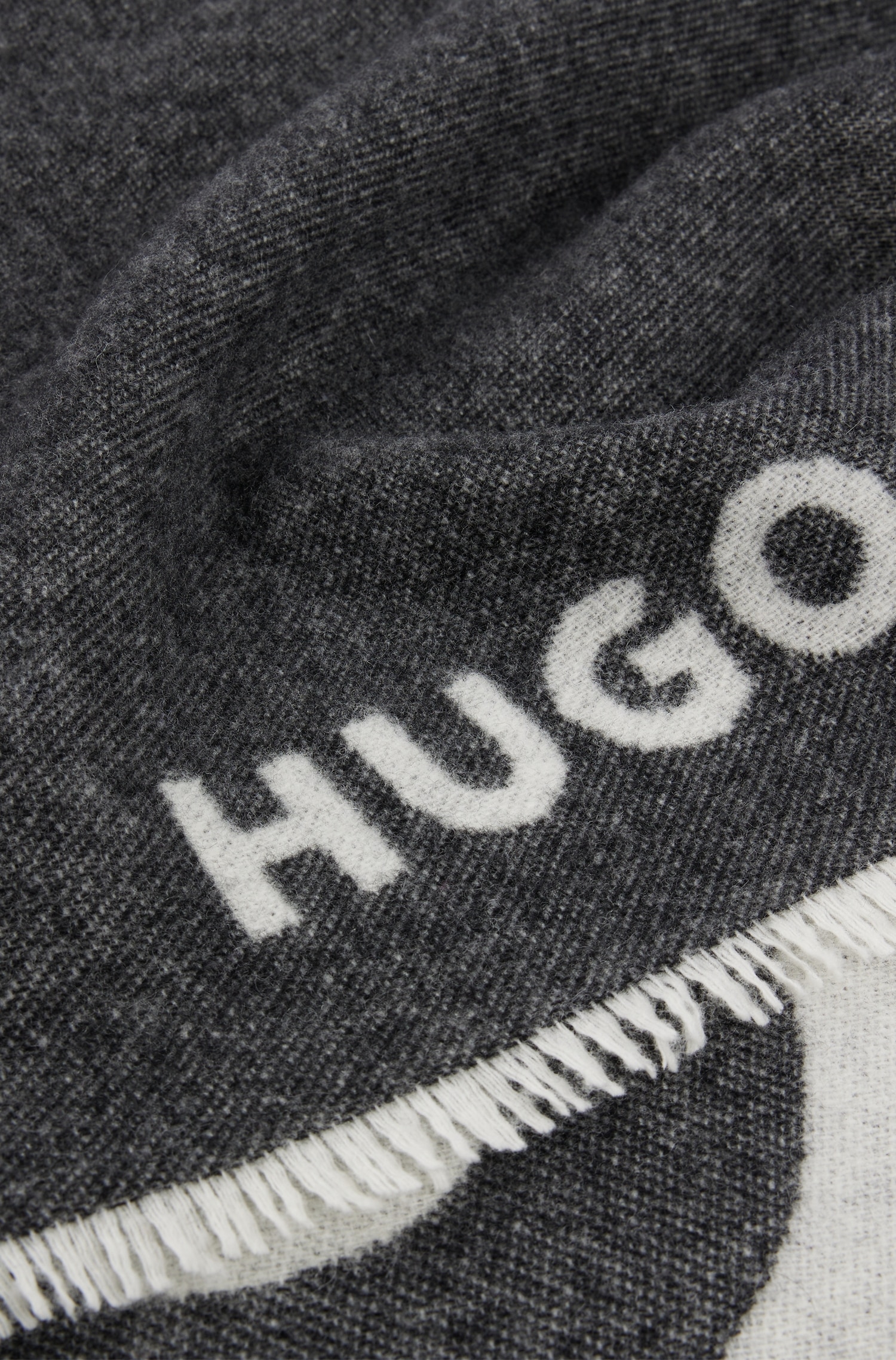 HUGO Schal »Alexie«, aus online kaufen Jelmoli-Versand Woll-Mix mit x 200 Kontrastfarbenem | Hugo-Logo, cm 32