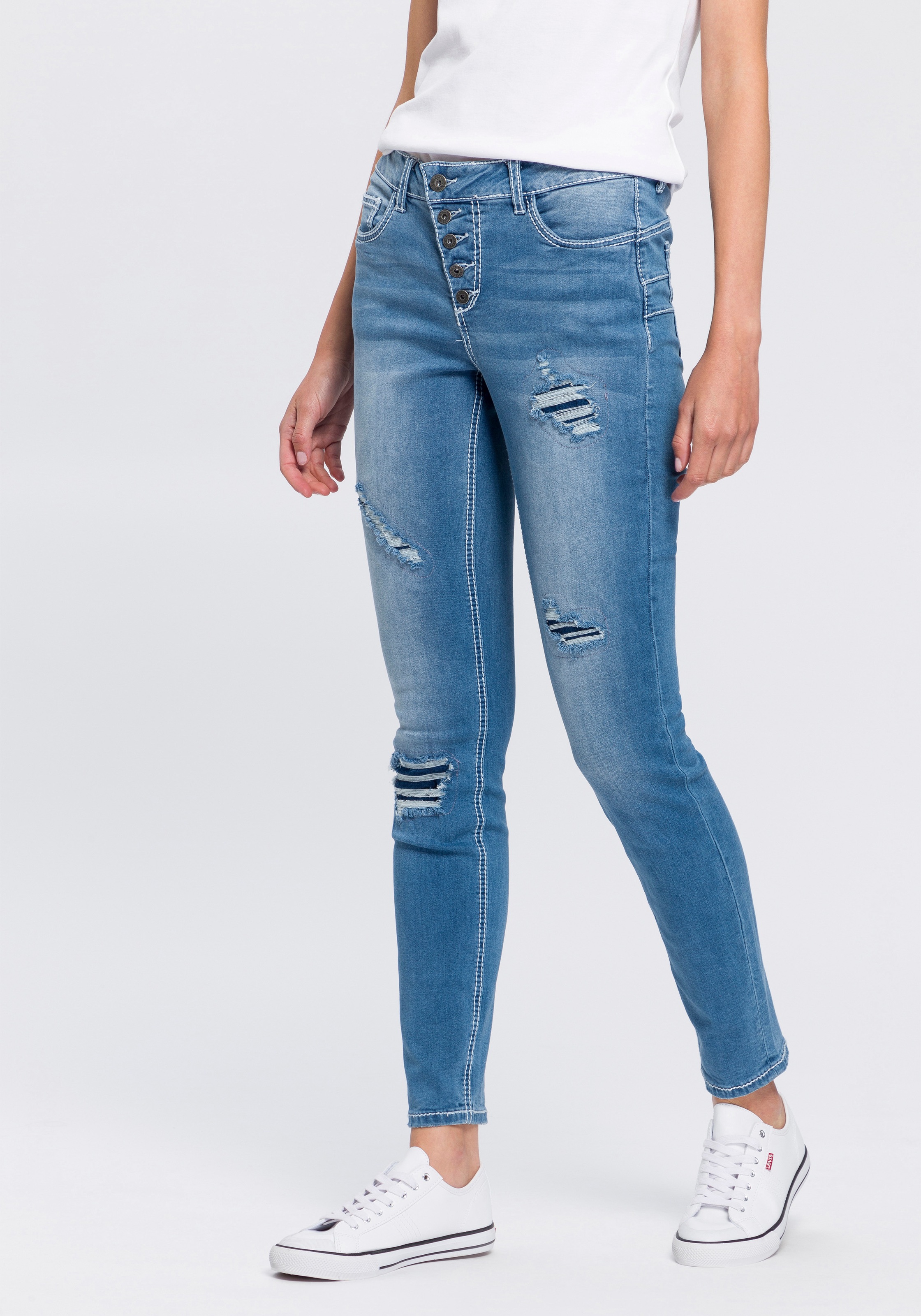 Arizona Slim-fit-Jeans shoppen Waist online »mit schräger Jelmoli-Versand Mid bei Knopfleiste«, Schweiz sichtbarer