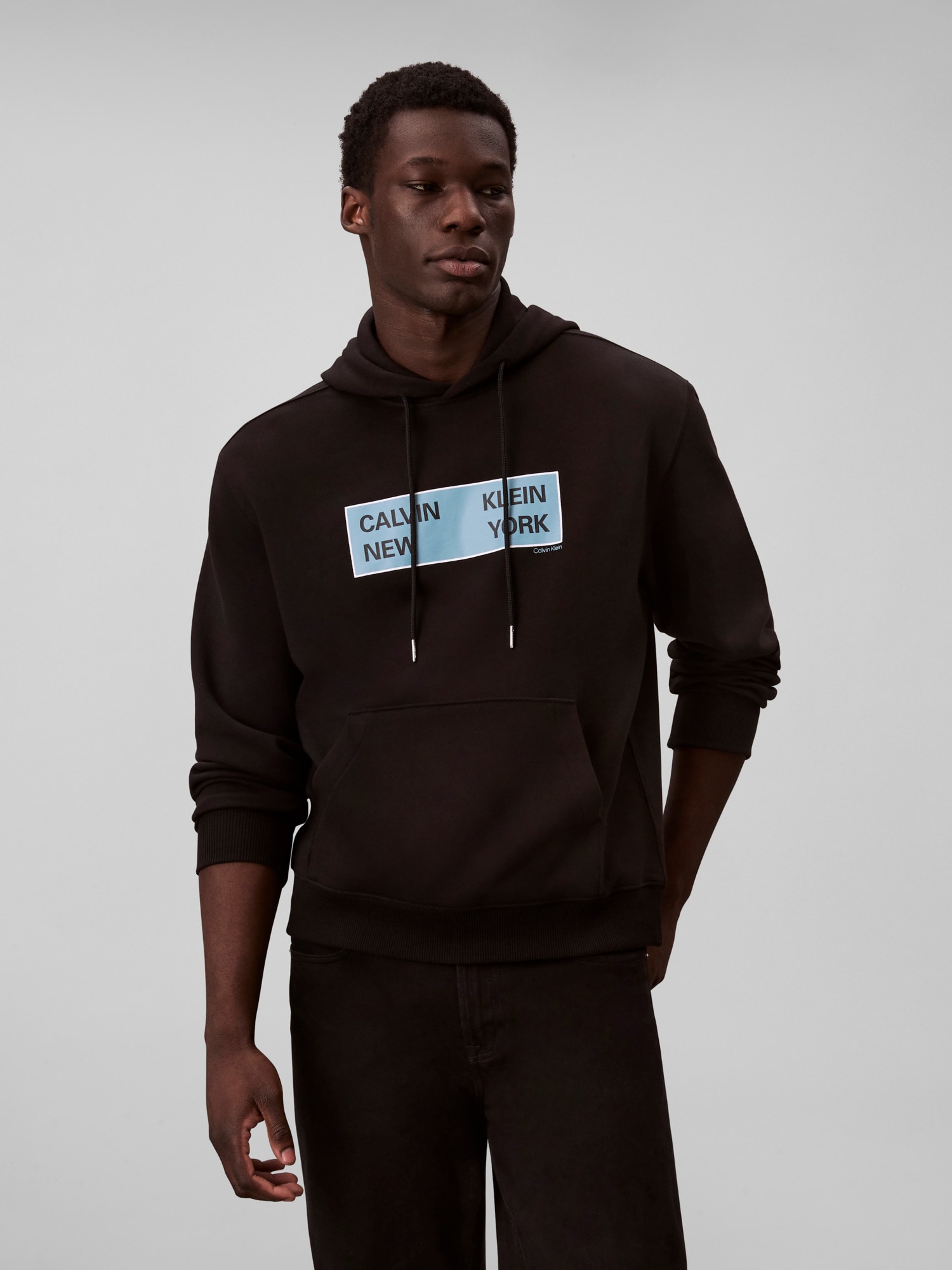 Calvin Klein Jeans Kapuzensweatshirt »LS EU 350TERRY CKNY BOX GRAPHIC«, Mit Rundhalsausschnitt, regular fit