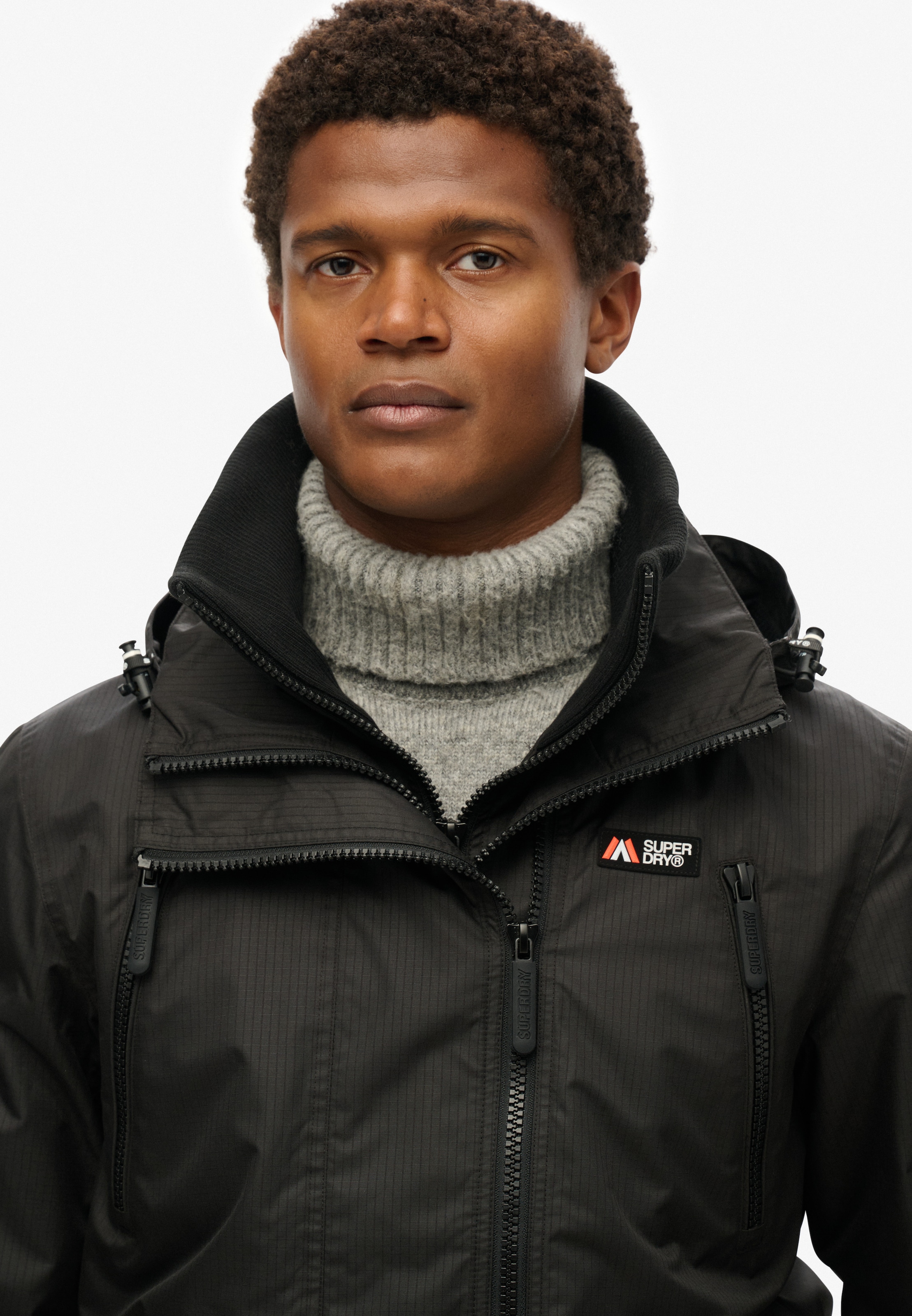 Superdry Outdoorjacke »HOODED MTN WINDBREAKER JACKET«, mit Kapuze