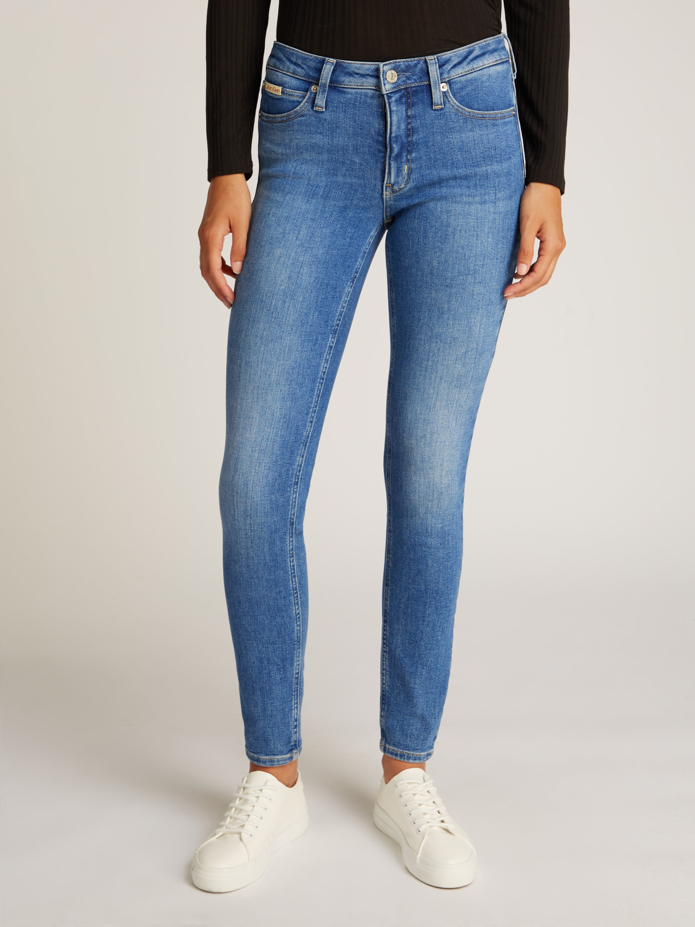 Calvin Klein Jeans Skinny-fit-Jeans »MID RISE SKINNY«, mit stoned wash Optik, mit Coinpocket