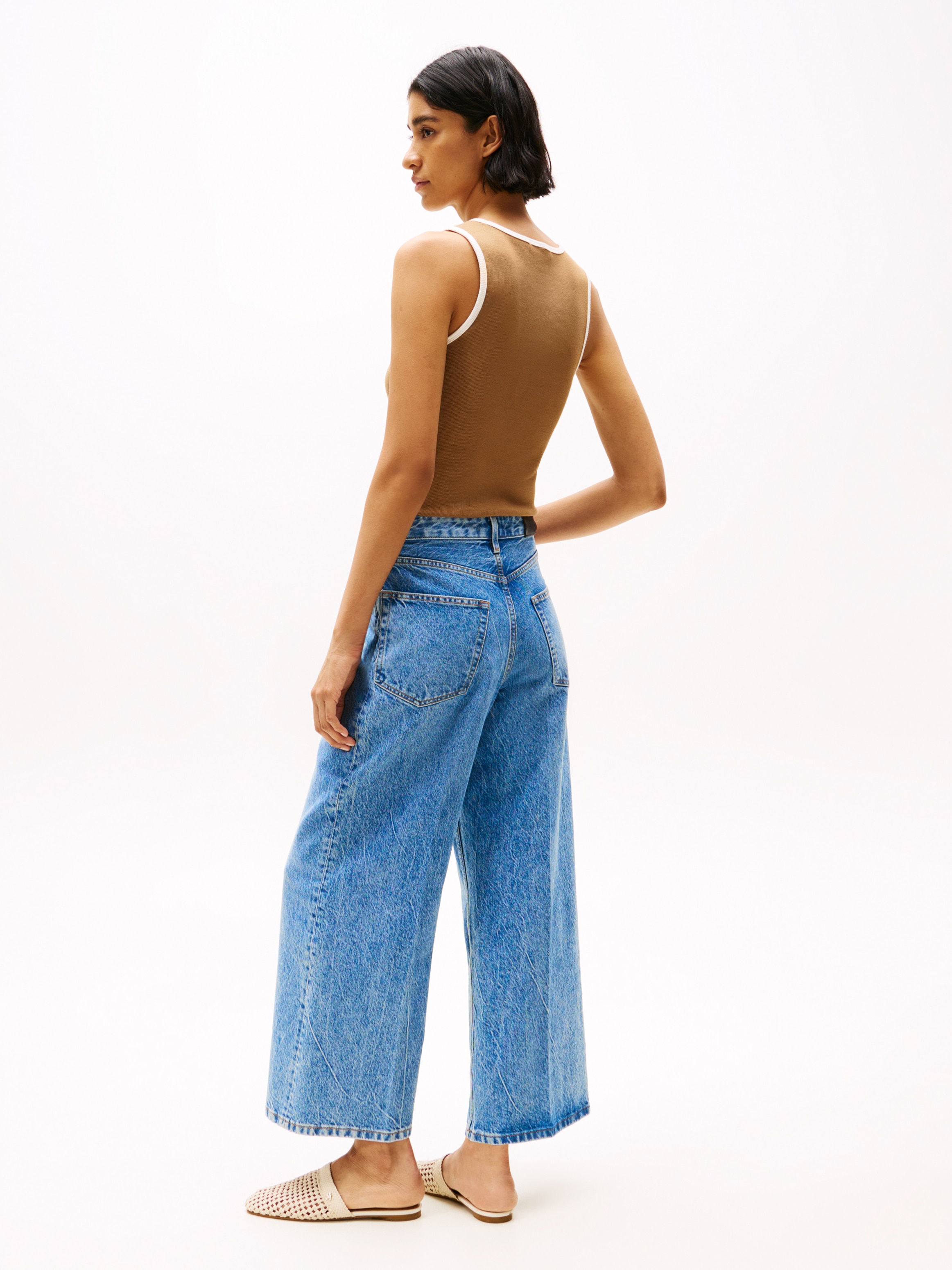 Tommy Hilfiger Weite Jeans »WIDE LEG HW LOU«, mit Logo-Badge, mit Nieten, mit Bügelfalten