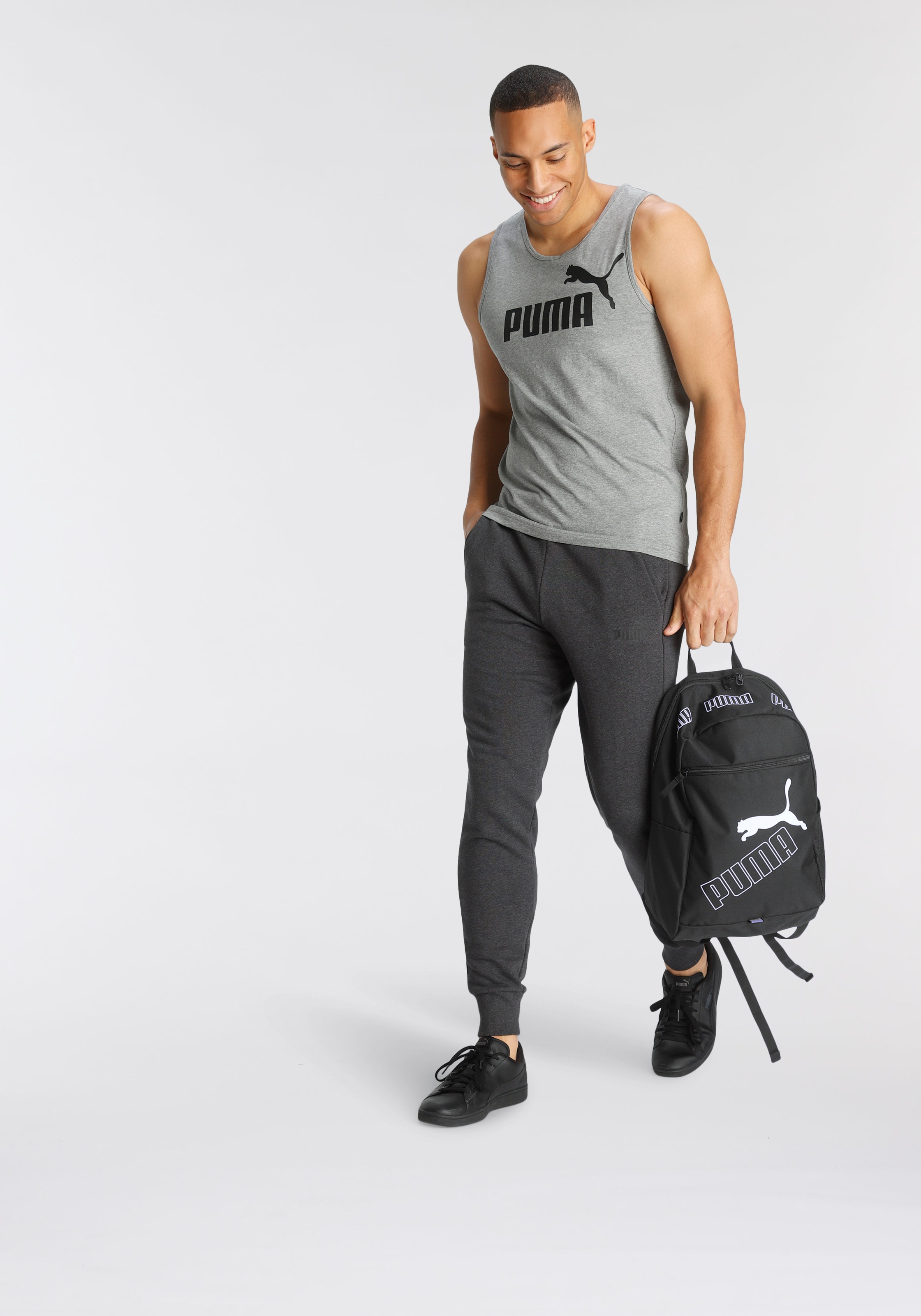 PUMA Trainingshose »ESS LOGO PANTS TR CL« für vielseitige Aktivitäten, aus French Terry, mit Eingrifftaschen