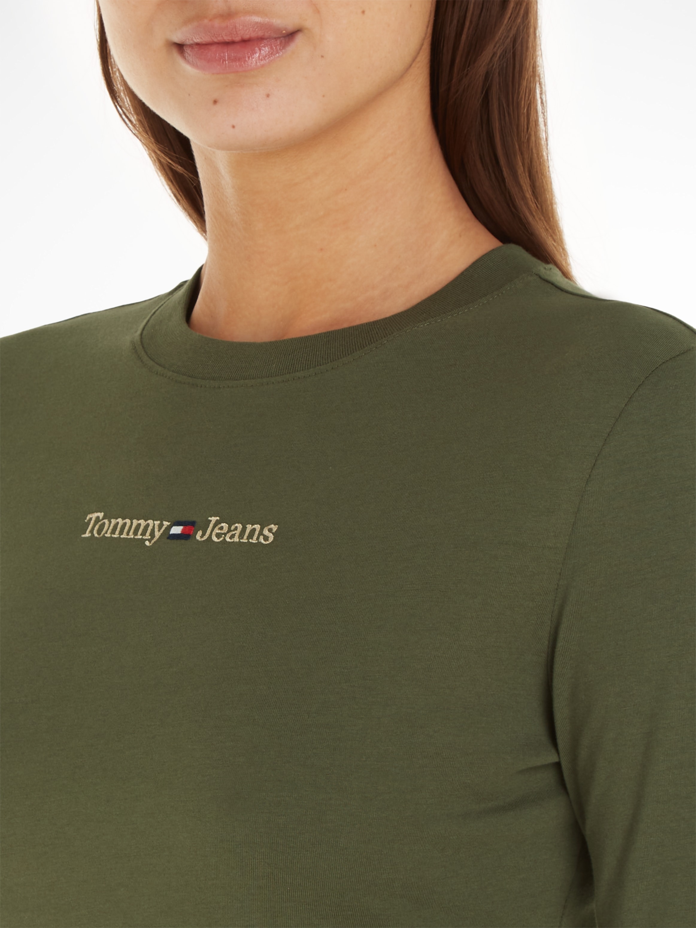 Tommy Jeans shoppen Linear Jelmoli-Versand | Jeans LS«, mit »TJW GOLD Logo-Schriftzug SERIF LINEAR BBY online Tommy Langarmshirt