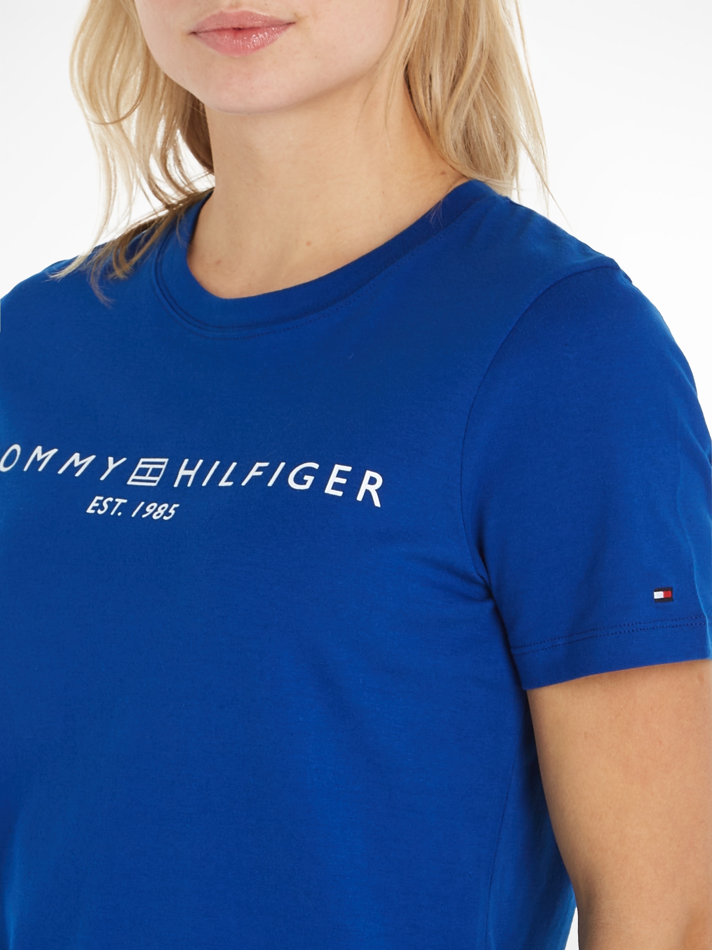 der erste Tommy Hilfiger T-Shirt Jelmoli-Versand LOGO CORP »REG | C-NK shoppen mit Logo online SS«