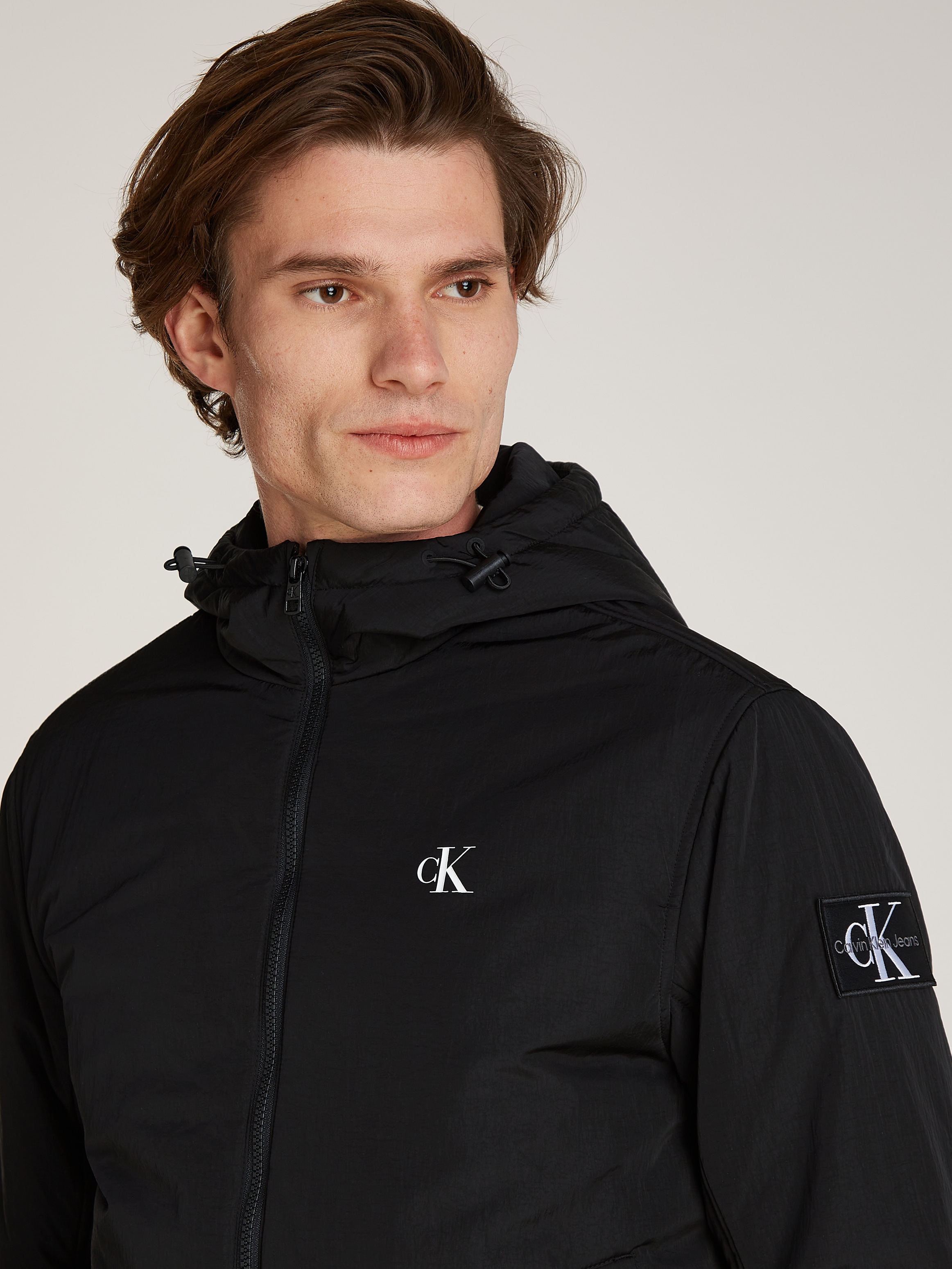 Calvin Klein Jeans Outdoorjacke »PADDED HOODED HARRINGTON«, mit Kapuze, mit Logoprägung