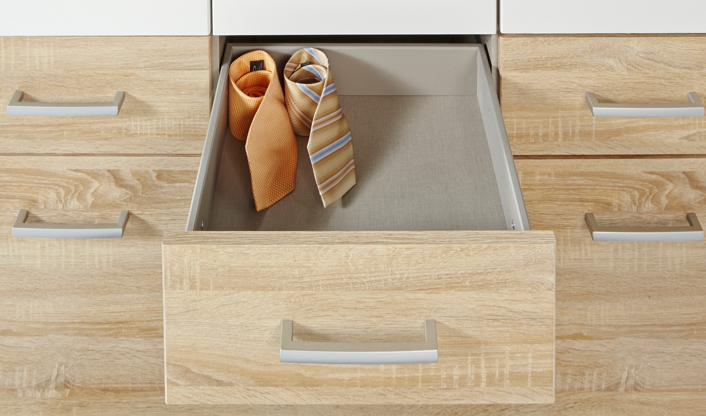 rauch Kleiderschrank »Drehtürenschrank Schrank Garderobe BURANO«, mit Schubladen und Spiegelumrandung in Farbabsetzung MADE IN GERMANY