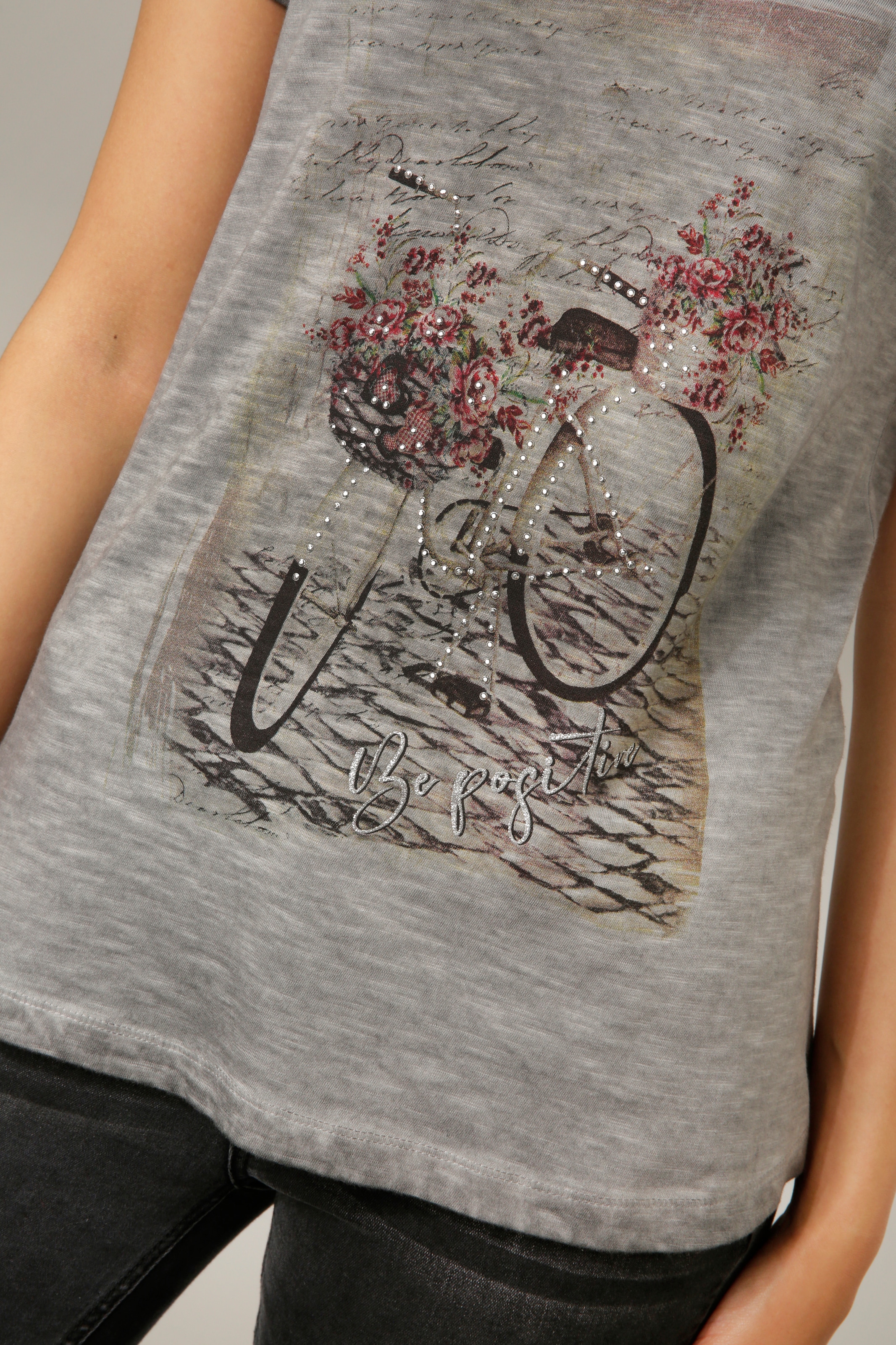 Glitzersteinchen Frontdruck Aniston CASUAL verzierter Jelmoli-Versand online T-Shirt, mit bestellen |