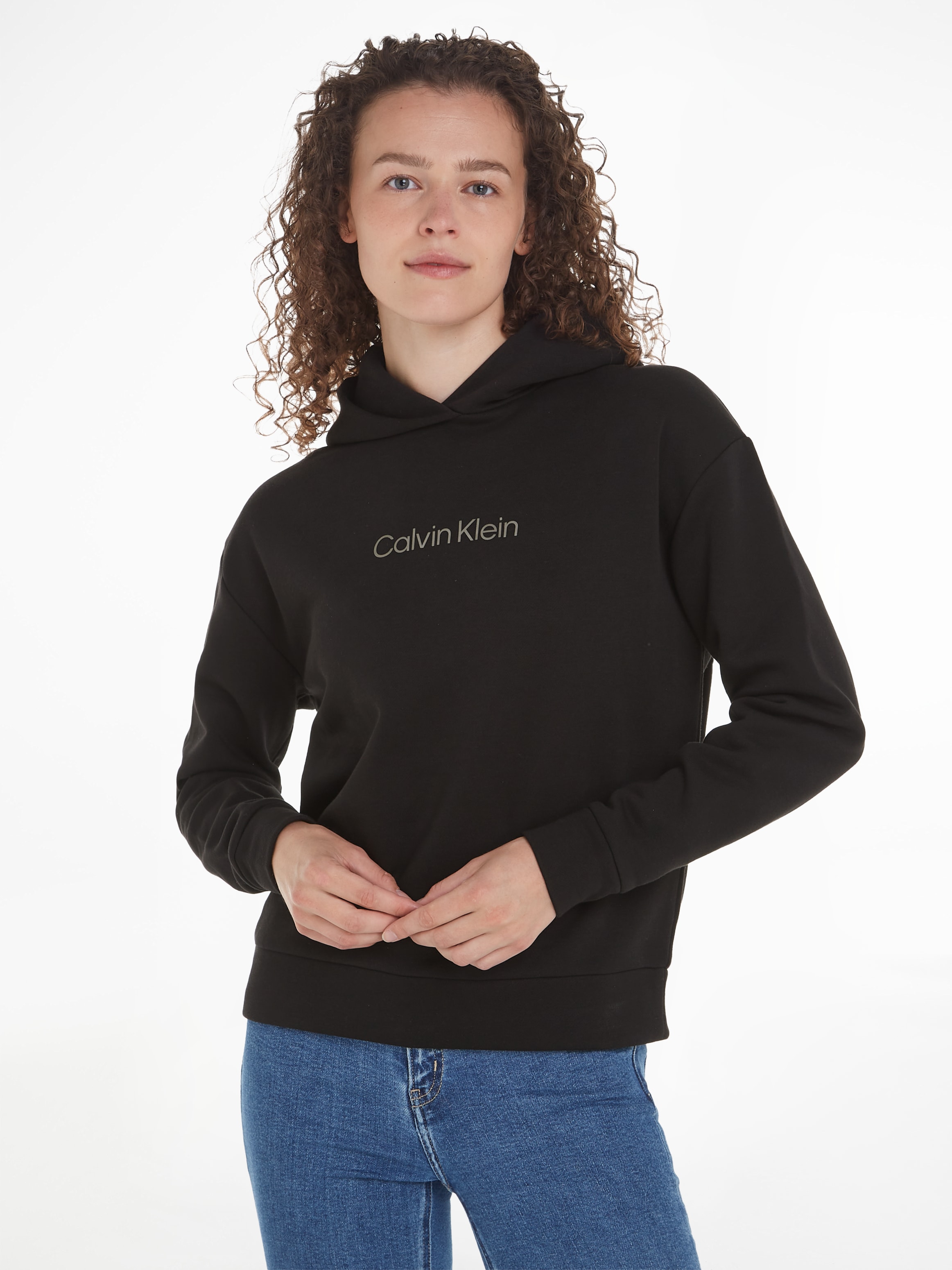 der »HERO bestellen Klein Calvin HOODIE«, | online auf Klein Kapuzensweatshirt mit Calvin LOGO Print Jelmoli-Versand Brust METALLIC