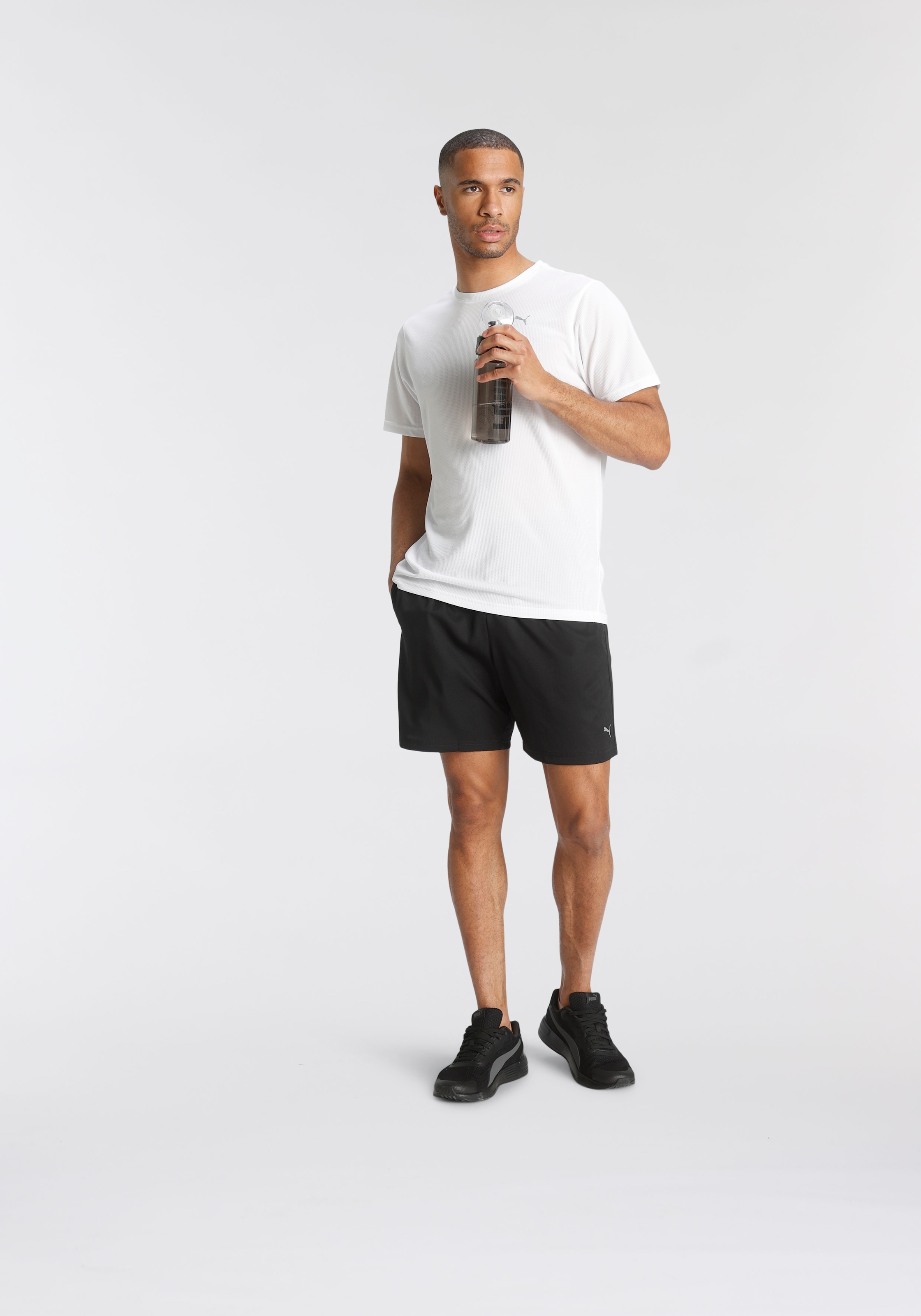 PUMA Trainingsshorts »PERFORMANCE WOVEN 7" SHORT M«
