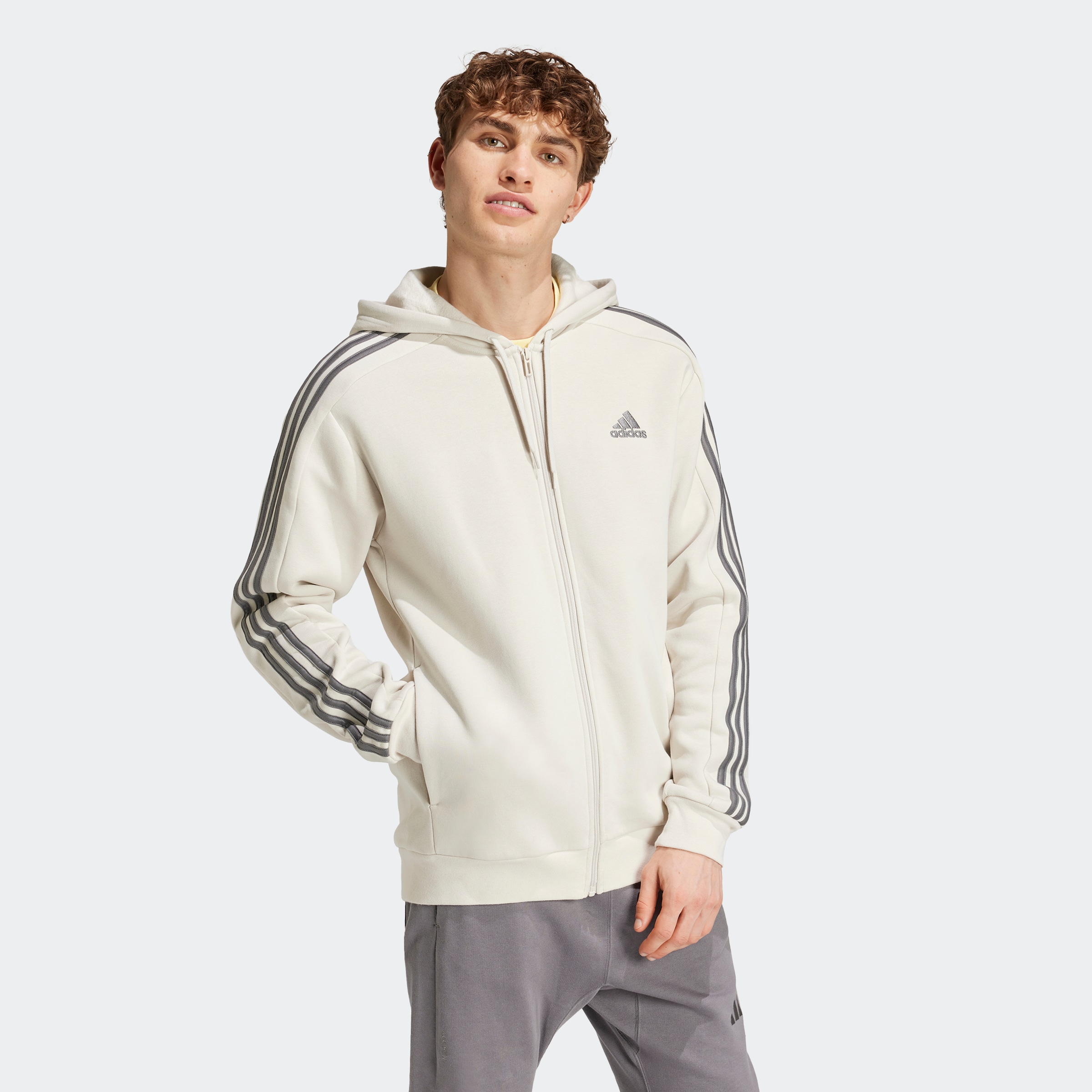 adidas Sportswear Kapuzensweatjacke »ESSENTIALS 3STREIFEN KAPUZENJACKE«, angenehmes Material aus Baumwollmix