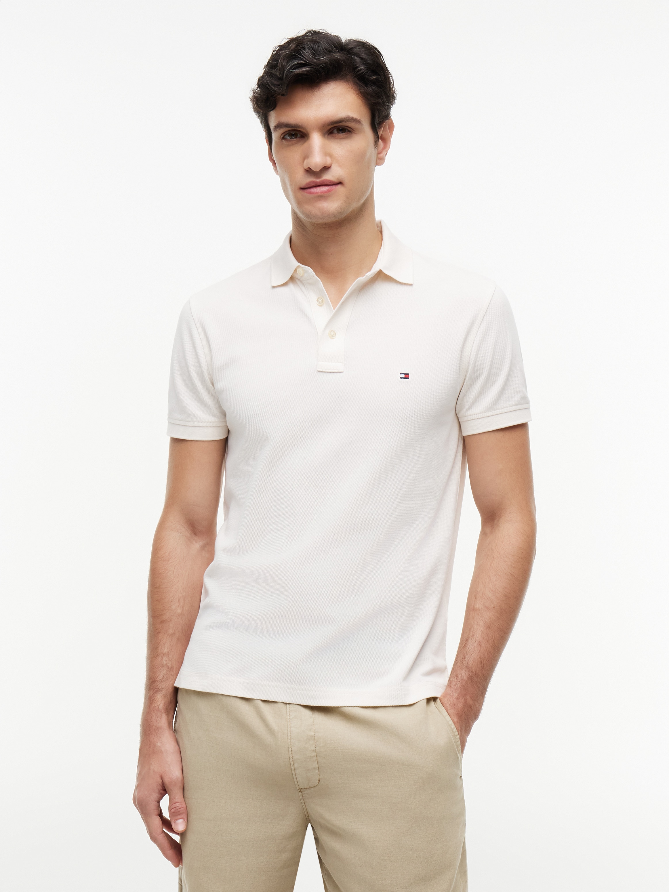 Tommy Hilfiger Poloshirt "1985 SLIM POLO mit Piqué-Struktur und Stickerei" meliert, casual, slim fit, Baumwollmix, Polokragen