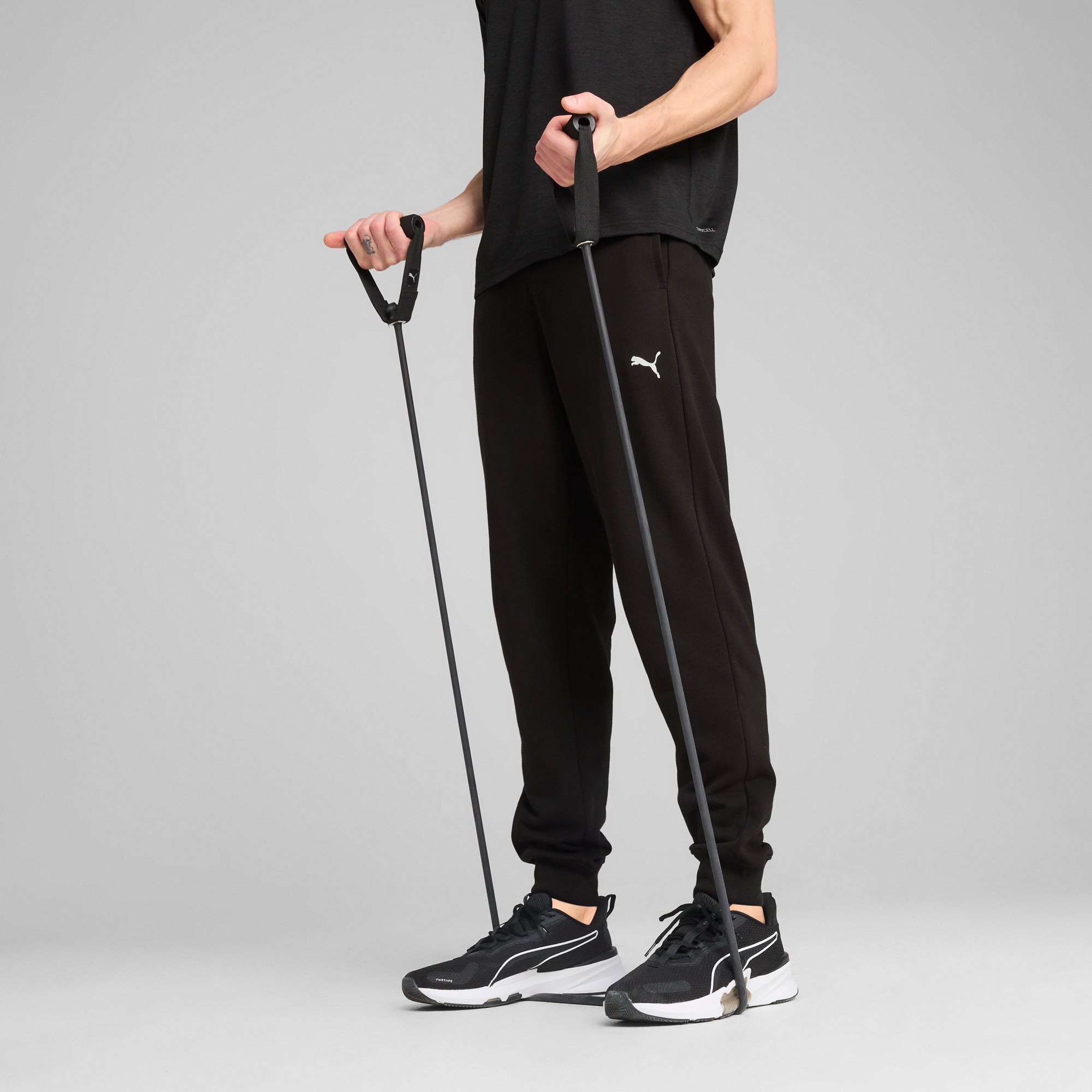 PUMA Trainingshose »M TAD ESSENTIALS FRENCH TERRY JOGGER« für Fitness und sportliche Aktivitäten, mit offenen Eingrifftaschen
