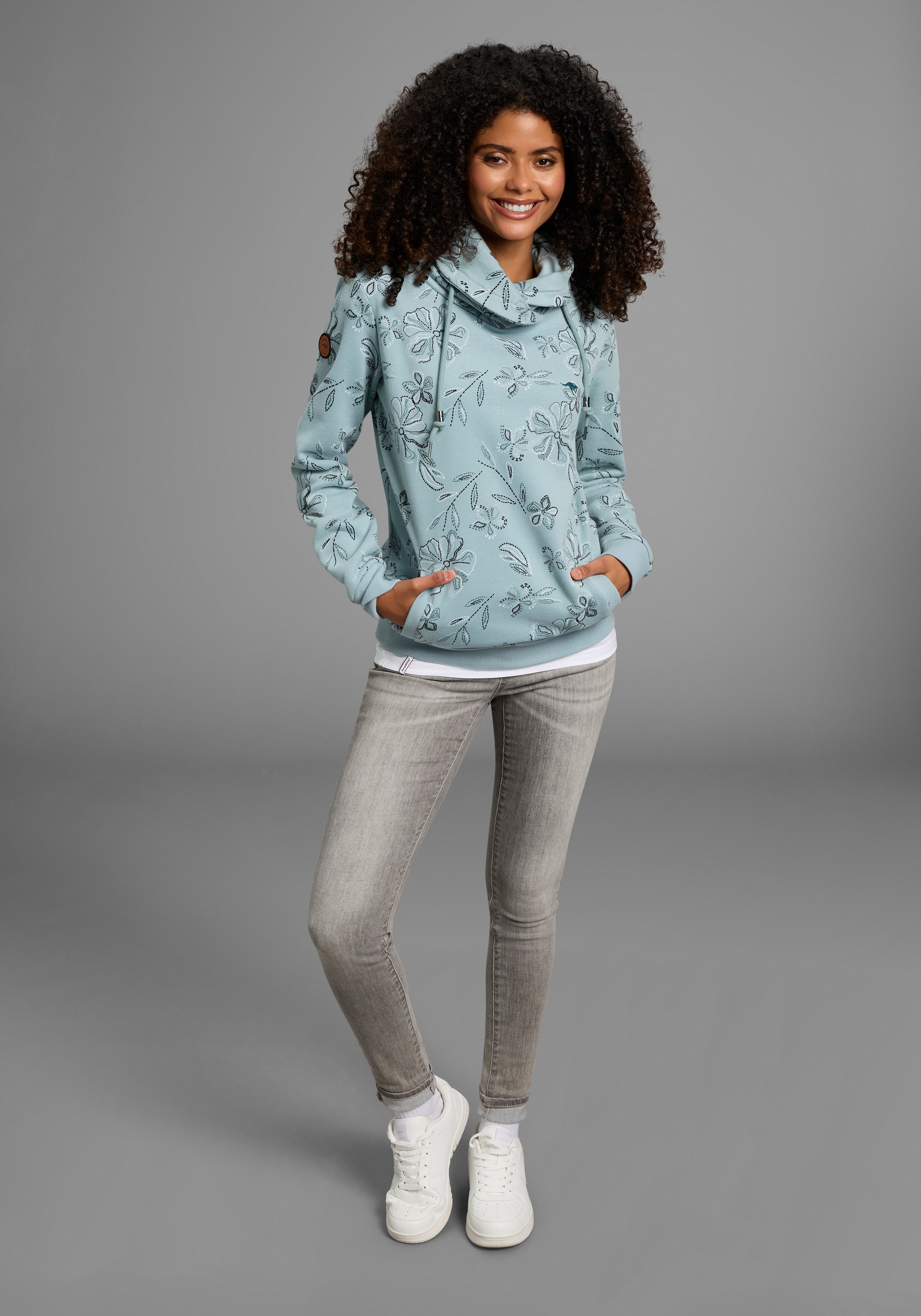 KangaROOS Sweatshirt, mit hohem kuscheligen Kragen und Alloverdruck